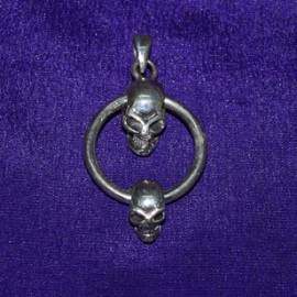 Skulls On Ring Silver Pendant